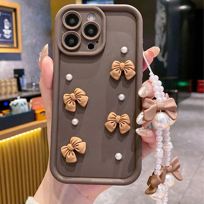 Korean 3D Bow Pearl Phone Case for iPhone 17, 16, 15, 14, 13 & 12 Pro Max | Cute Silicone Case with Lanyard